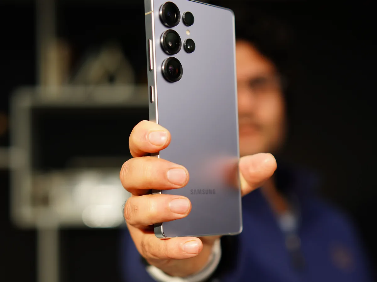 Real Samsung Galaxy smartphone held in hand