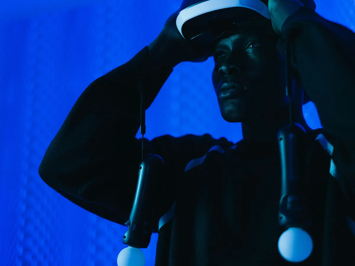 Real person using a virtual reality headset and controllers